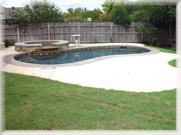 Kidney Bean Shaped Swimming Pool With A Jacuzzi