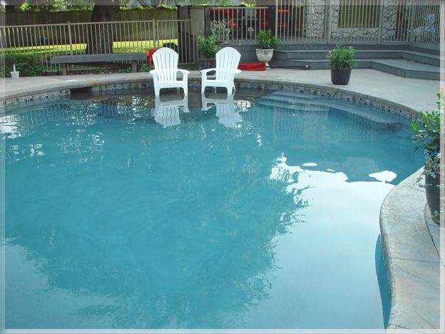 Two Chairs In A Pool